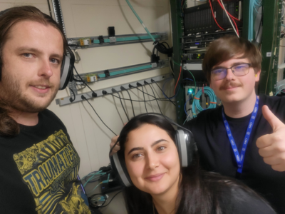 Part of the liquid argon calorimeter team at CERN working on dismantling some of the electronics from the existing detector. CPPM Credit